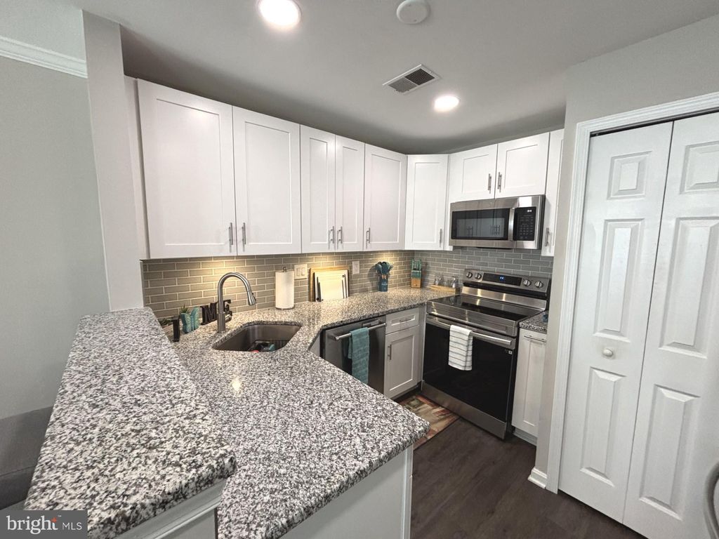 Photo of 10 - D Fallen Tree Court #204, HALETHORPE, MD 21227 (MLS # MDBC2159992)