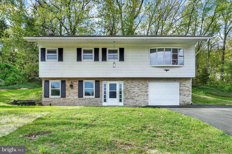 Fully remodeled three-bedroom, two-bath home in the desirable Central York School District. This tastefully updated home features brand new luxury vinyl plank floors, fresh carpet, and crisp new paint throughout. The kitchen shines with granite counters, porcelain tile backsplash, and stainless steel appliances. Enjoy a cozy fireplace in the family room, a formal living room, plus a huge bonus living space perfect for entertaining. Conveniently located with schools, shopping, and Route 30 just minutes away. Move-in ready and absolutely beautiful.