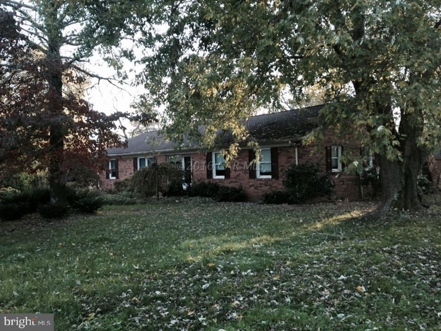 Recently remodeled all brick rancher close to town but no town taxes. Kitchen with granite countertop, large great room with fireplace. Move in ready. Being sold AS IS. Short sale lender has approved this list price and should only take about a week for them to review an offer.