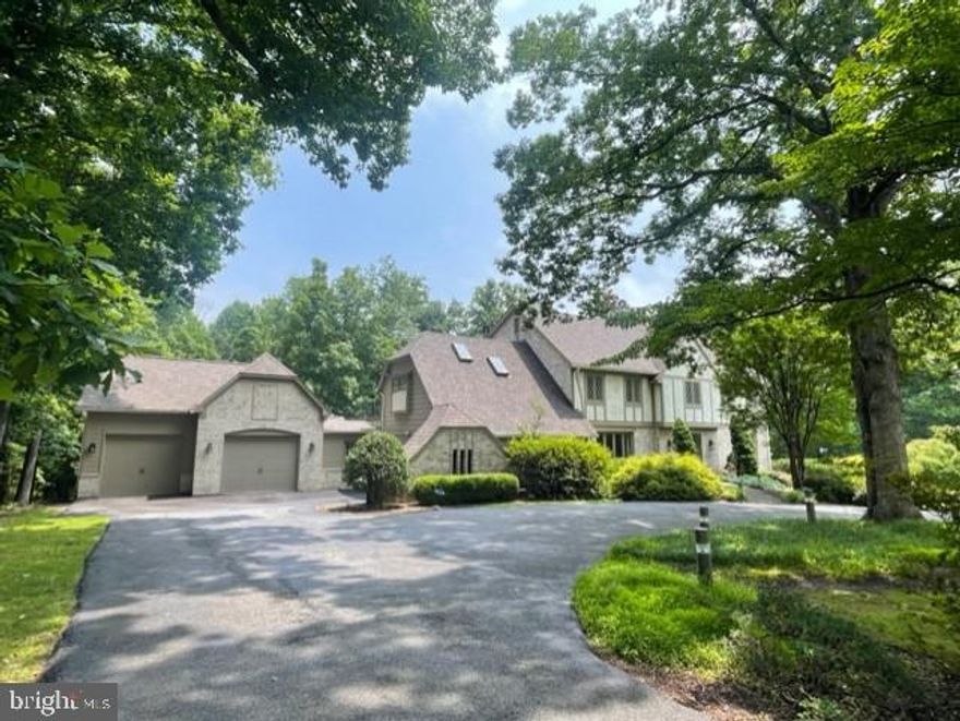 Oh, wow!  Waiting for a spectacular, renovated home to hit the market?  Well, here it is!  This 7,000+ SF home located in one of Potomac's most highly coveted communities, Camotop, has an unbelievably beautiful 2 acre setting with a pool, a tennis court (potential pickleball court!!) and a large playing field.  If you are looking for that home you never have to leave, this is it!  Offering a wonderful, comfortable lifestyle and every outdoor amenity possible, this home has it all.  The Main Level opens with a  dramatic 2 story Entry Foyer with a sweeping staircase, a private Home Office, a fantastic all-new Chef's Kitchen/Great Room, a perfectly proportioned Dining Room for large holiday gatherings and the oft-requested Mud Room, this one with storage plus a Pool Full Bath and Sauna!  These Owners completely renovated the Kitchen/Great Room area opening the wall to join the two rooms.  For the chef in the family,  there's a large center island workspace, top of the line appliances including a vacuum oven to seal your sous vide food, a six burner range with a griddle, a coffee bar and so much more!  The combination Kitchen/Great Room is perfect for family living or large scale entertaining.   An inviting screen porch opens from the Great Room and looks over the pool and tennis court.  The Upper Level has a very large Primary Suite with a sitting room, private balcony, huge walk-in closet and a sumptuous Primary Bath.  Three other generously proportioned bedrooms and two newly renovated full baths complete the second floor.  The daylight, walk-out lower level has an excellent entertaining space with a recreation area with a wet bar, a media room with a fireplace and two additional bonus rooms with two newly renovated full baths - perfect for exercise or hobby rooms.   The backyard is an absolute  delight with a second kitchen including a pizza oven (!!), an in-ground heated pool, a newly resurfaced tennis court and a large play space.  In addition to many interior upgrades, these Owners added a second garage with room for three cars or possibly six if you use lifts.  This incredible space is so well designed architecturally, it melds perfectly with the facade.  Inside, the reinforced foundation, high ceilings, EV ready electric panel and big open areas will thrill any car lover/collector.  If you aren't a car buff consider this space as an art studio, a cross fit work-out gym, a pilates studio --use your imagination!   Move-in ready and meticulously maintained. this home could be yours before school starts!  Act now!  Churchill Cluster