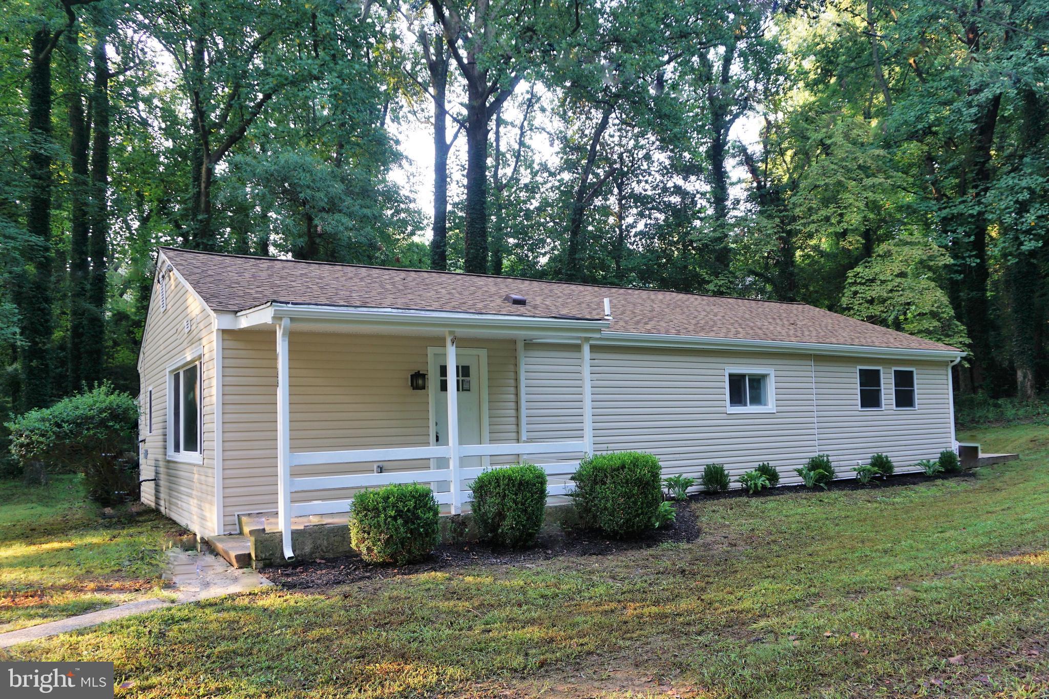 ***NOT LOCATED ON RITCHIE HWY-3 LOTS BACK ON PRIVATE DEAD END ROAD***SEVERNA PARK SCHOOLS*** COMPLETELY RENOVATED INSIDE AND OUT*****MUCH LARGER THAN APPEARS***** EVERYTHING IS NEW-PLUMBING, ELECTRIC, LIGHT FIXTURES, WINDOWS, HVAC***ABSOLUTELY BEAUTIFUL***INTERIOR OFFERS FOUR BEDROOMS AND TWO FULL BATHROOMS, GEORGIOUS HARDWOOD FLOORING, STUNNING MAIN LEVEL OPEN FLOOR PLAN WITH AMAZING KITCHEN INCLUDING WHITE SOFT CLOSE CABINETRY, QUARTZ COUNTERS, STANILESS STEEL APPLIANCES, LARGE ISLAND AND SPACIOUS PANTRY*HUGE OWNERS SUIT INCLUDES LARGE WALK-IN CLOSET, SPACIOUS EN-SUITE WITH CUSTOM TILE & DUAL VANITY ALONG WITH SLIDER TO DECK*EXTERIOR INCLUDES PRIVATE WRAP-AROUND DECKING SURROUNDED BY MATURE TREES ON .46 ACRES***PLENTY OF PARKING AND NO HOA***A MUST SEE***