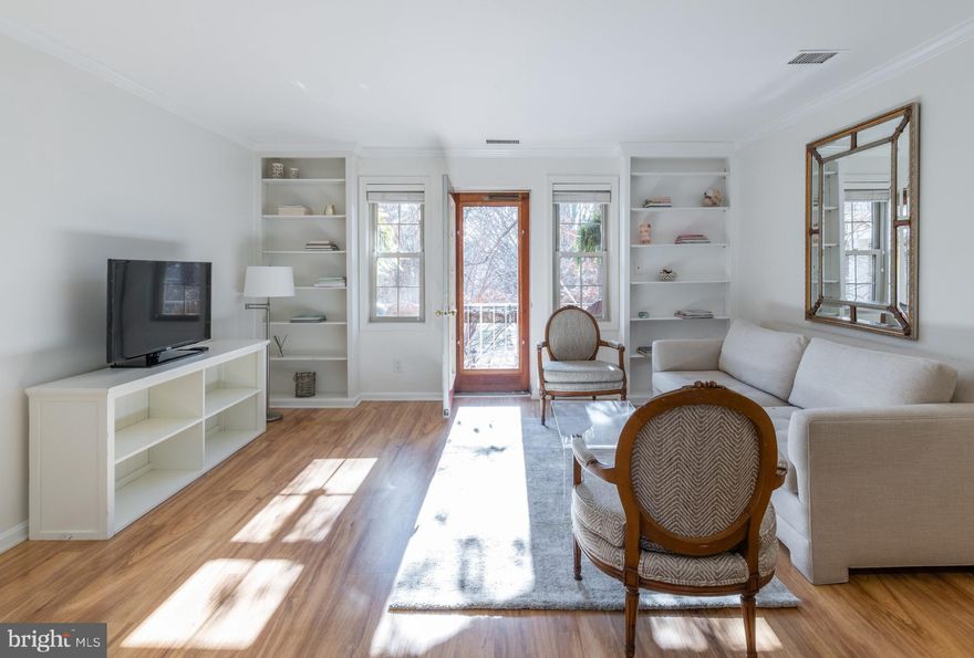 GORGEOUS, SUNNY, RENOVATED with COURTYARD VIEWS! Southern facing balcony has expansive courtyard views overlooking the community gazebo. Two unassigned Parking Lot spaces and Extra Storage make living in Harbor Terrace a joy! Living room is awash in natural light with built-in bookcases on both sides of the balcony door. This spacious room has a dining area. Kitchen features white cabinetry, granite counters, stainless appliances and front loading Bosch washer & dryer and has a window with wood blinds. Bathroom has white subway tile tub surround, granite vanity and two windows.  The spacious bedroom easily fits a king size bed, has two windows and two closets. Custom wood blinds and wood laminate floors are throughout. 2 pets ok. Don't miss this beauty ... open Saturday and Sunday 1-4pm.