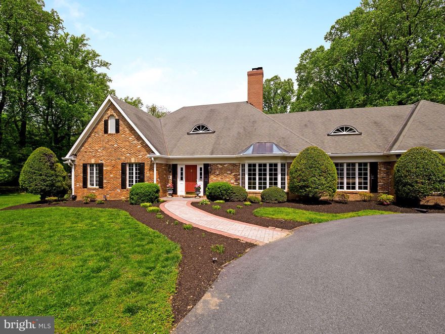 CONTRACT HAS BEEN RATIFIED AND THE OPEN HOUSE IS CANCELLED. Looking for a lovely home in close-in Potomac with a pool, sprawling lawn, screened porch, main level bedrooms and in-law suite? This is it! This large, lovely Rambler sits on a serene, level  two+-acre corner lot minutes from Potomac Village, was re-built and en-larged in 1997 and has two fully finished levels with 5,000+ square feet of space to enjoy. Beautiful Main Level Owners Suite with fireplace, luxury Bath and views of the grounds. In-Law Suite with separate entrance on main level. Lovely Living Room with bay window and fireplace. Library/ Office with built-ins. Elegant Dining Room with tray ceiling. Gourmet Kitchen with center isle and double sinks. Breakfast area. Family Room with fireplace.  Nicely finished lower level with large Recreation Room, 5th Bedroom, full Bath, Media Room, and more. A circular driveway leads to the home. A large entry Foyer with tray ceiling welcomes guests. Lovingly designed by its owners, who built the house on the site of an old 50's rambler, giving it a raised roof and spacious flow with high ceilings, with French country style in mind. There are many extra features including a detached garage with space for three cars, gazebo, hardwood and porcelanosa floors, beautiful moldings, wide hallways, three fireplaces, recessed lighting, a generator, nice built-ins and steam shower. The 20' by 40' pool is fenced and has an automatic pool cover. You will love this home and the incredibly serene setting!