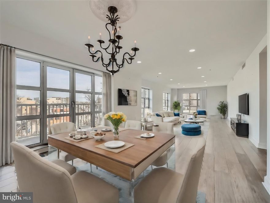 This two bedroom unit , originally a three bedroom, has been customized to maximize the corner views and living room space while still offering second bedroom/den/office.   A light color palette emphasizes the abundant light and open space.   All mechanicals, including HVAC and water heater are new with this renovation.   A formal, elegant double door entry opens onto a wide foyer with a contemporary remodeled kitchen with upgraded countertops and stainless appliances.  The breakfast bar overlooks a spacious dining area, and just beyond, french doors lead to a large eastern facing balcony.   A series of oversized windows frame snapshots from historic Little Italy all the way to the sparkling towers of Harbor East.  In the primary suite, occupants are spoiled with a giant walk-in closet, a set of french doors leading to a covered terrace with harbor and city views, and a sumptuously renovated bath with walk-in shower.   Lots of closet/storage space and garage parking for one car included.  Enjoy the Indoor pool, sundeck, fitness center, community room, resident library, game room, and 24-hour staffed front desk .  Our on-site real estate office will  facilitate all viewings.  Call us for a tour.