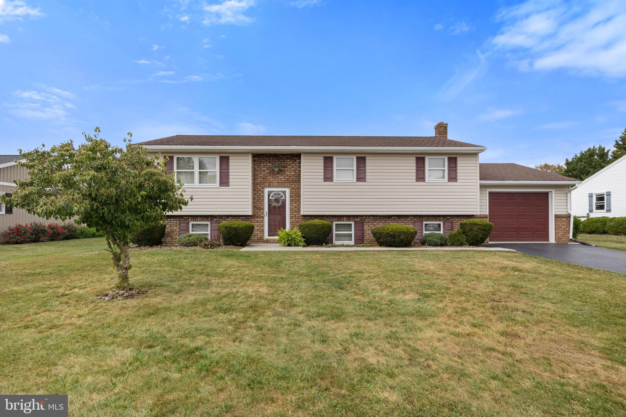 Welcome to 253 Vincent Dr in Conewago Valley School District. This home has been well cared for by it's one owner. As you enter the home there is beautiful hardwood floors on the steps, living room, dining room, and hallway. The living room is a nice size to sit and enjoy a book or quiet time. There is a dining area that goes to the kitchen with a ceiling fan and all appliances conveying. There are 3 nice size bedrooms that round out the upstairs as well as a large bathroom. The finished family room is large with walk out doors for easy acess. There is also a 2nd bathroom in the lower level as well as plenty of storage space. The deck was replaced with engineered wood and the outside is maintenance free. There is a one car garage for winter parking and the home sits on a nice level lot in a well established neighborhood that is quiet and close to a park, shopping and schools. A little cosmetic updating will make this a great home
