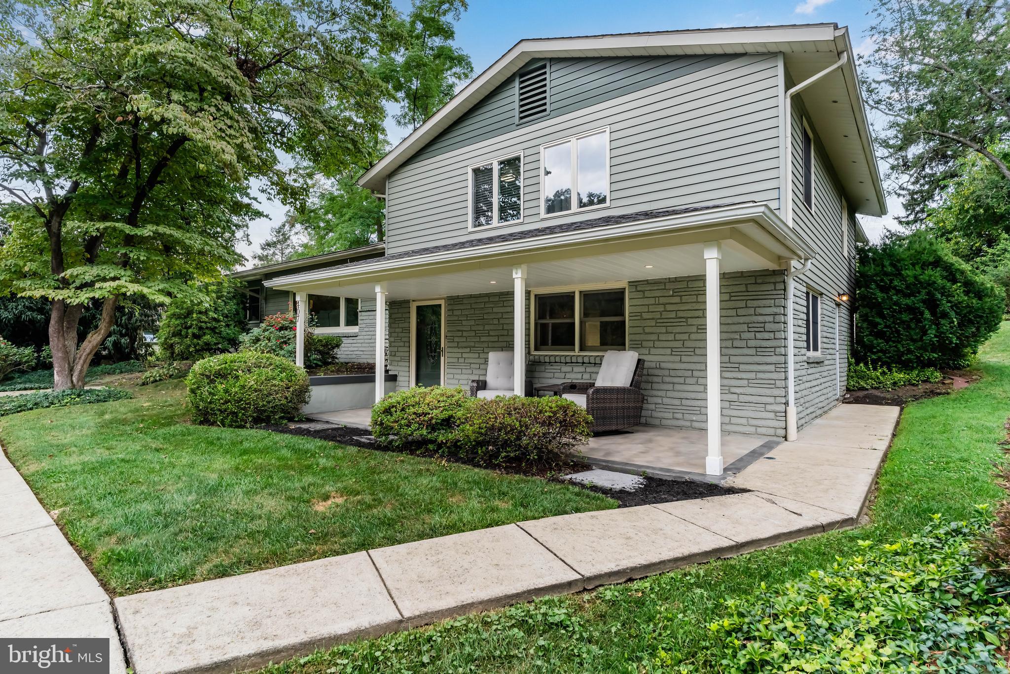 STEP INTO PERFECTION! Nestled amongst colorful and mature trees and landscaping, you are certain to appreciate the unmistakable attention that was given to the design and detail of this updated home. A lovely covered front porch adds to the curbside appeal. Step inside to the foyer which opens into the spacious family room with modern barn door that offsets this space and accentuates the homes unique and pleasing design. Natural light is abundant and the neutral modern color palette adds to the brightness of the interior living area. The charming living room with chic window treatments provides an extra entertainment area. The roomy but intimate dining room is ideal for two or twelve! The kitchen has been completely modernized and offers a huge picture window that lets the outside in, granite counters, sleek recessed lights and Stainless Steel appliances. You'll love the warmth and roominess of the primary bedroom where you'll find an adjacent sitting room, spacious walk-in closet and private bath. Two guest bedrooms share a luxurious full bath with step in shower. Outdoor entertaining is a delight with a private pavered patio and stately trees that surround the home. All this in a great location close to shopping, gyms, major highways, popular restaurants and just minutes from Hershey Park, or a short drive to Lancaster, historic Gettysburg or Baltimore's Inner Harbor. Make the first step to better living! Call now!