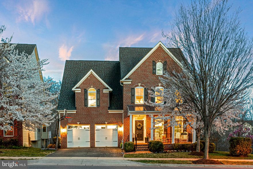Stunning residence on one of Clarksburg Village’s most desirable lots, showcasing a beautifully upgraded interior and exceptional outdoor living. The main level features white oak hardwood floors, custom oak and wrought iron railings, and an open-concept layout filled with natural light—further enhanced by six additional windows, thoughtfully incorporated beyond the builder’s standard offerings. The fully renovated chef’s kitchen is a standout, offering quartz countertops, a marble tile backsplash, and a premium six-burner Café appliance suite. A versatile main-level flex room provides the option for a private home office or convenient bedroom. Upstairs includes four spacious bedrooms, three full bathrooms, custom closet systems, and a dedicated laundry room. The finished lower level is designed for entertaining, complete with a wet bar, ice maker, wine and beverage refrigerators, dishwasher, full bathroom, and ample storage. Outdoor living is equally impressive with a Trex composite deck featuring an integrated weatherproofing system, a Pennsylvania bluestone patio, and a generously sized covered front porch with a custom 8-foot depth—both pre-wired for audio. Enjoy all that Clarksburg Village has to offer, including pools, clubhouses, walking and biking trails, and close proximity to shopping, dining, and Little Bennett Regional Park.