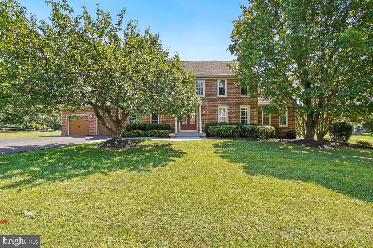 Expansive Brick Front Single-Family Home on a Sprawling 1 Acre Lot in Germantown!
Discover over 5,000 square feet of living space in this beautifully maintained brick front colonial, ideally situated on a picturesque 1-acre lot. Featuring 5 bedrooms, 3.5 bathrooms, including an in-law suite, this home offers the perfect blend of elegance, space, and flexibility for multigenerational living.
Step inside through the stately double doors to find fresh paint, brand-new carpet throughout. The entry is flanked by formal living and dining rooms. The living room is bright and inviting, with recessed lighting. The dining room offers beautiful wainscoting detail and a classic chandelier.
The upgraded eat-in kitchen boasts granite countertops, stainless steel appliances, a large center island with breakfast bar seating, and abundant cabinetry. Enjoy meals in the spacious eat-in area or step out onto the expansive deck to take in serene views of the mature tree line and lush, park-like backyard.
The kitchen overlooks the cozy family room with oversized picture window letting in tons of natural light and a charming brick wood-burning fireplace. Just off the family room, you’ll find a dedicated home office featuring wall-to-wall built-in shelving, vaulted ceilings, and private access to a second outdoor deck.
The main level also includes a powder room, a well-equipped laundry room, and access to the attached two-car garage.
Upstairs, retreat to the spacious primary suite with dual closets, including a walk-in, and ample room for a sitting area. The ensuite bath features a dual-sink vanity, walk-in shower, and luxurious soaking tub. Three additional well-sized bedrooms share a full hallway bath.
A private fifth bedroom suite offers flexible living options for in-laws or guests, complete with a full bath, generous closet, and its own rear staircase for added privacy and convenience.
The walk-out lower level includes a large rec room that opens to a beautiful stone patio and expansive backyard ideal for entertaining. Two large storage rooms provide excellent potential for future finished living space.
All of this in a prime Germantown location, just minutes to shopping, dining, parks, and major commuter routes. Schedule your showing today and don't miss out on this opportunity!
