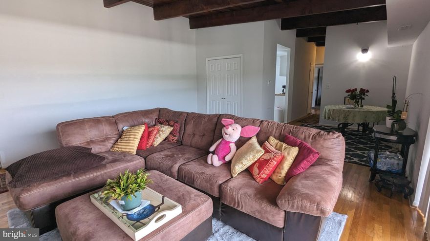 Welcome to this delightful two-bedroom, one-bathroom condo situated on the top floor, offering an abundance of natural light and a warm, inviting atmosphere. Located in the heart of New Carrollton, this property is perfect for those seeking convenience, comfort, and style.

Upon entering, you'll be captivated by the sun-filled interior that bathes the living space with a natural glow. The layout seamlessly integrates a spacious dining room and a well-designed kitchen featuring attractive butcher block countertops. The exposed beams add a touch of rustic charm and create a cozy ambiance, making this condo a unique and special find.

The two well-appointed bedrooms provide ample space for relaxation and rest, while the bathroom boasts modern amenities for your convenience. With a thoughtful floor plan, this condo maximizes every inch of space, ensuring a comfortable and efficient lifestyle.

One of the standout features of this property is its excellent location. Positioned conveniently close to public transportation, commuting to nearby cities or exploring all that Maryland has to offer becomes a breeze. Plus, the proximity to a plethora of restaurants and shopping options allows for enjoyable and diverse dining experiences and retail therapy right at your doorstep.