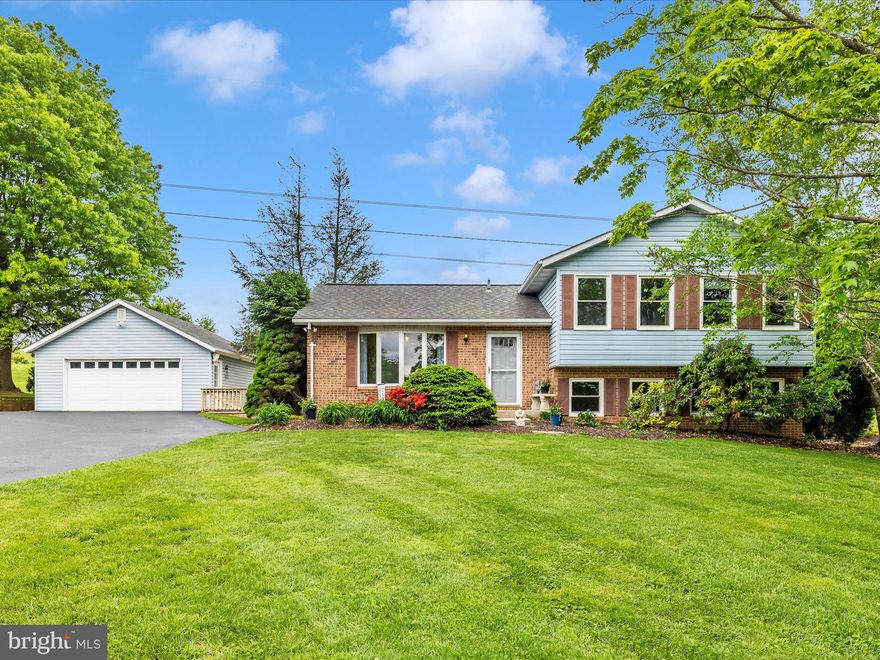 4 Level Split in Candice Estates/Christy Acres on almost an acre! Original Owners have maintained this home with pride of ownership! Main Level features a Great Room with Island Kitchen open to Living & Dining. Kitchen features Maple Cabinets, Solid Surface Counters & Stainless Appliances; Island is Copper with old barnwood wainscoting and maple cabinets. Beautiful Random Width Pine Floors (like you see in old farm houses) and a Slider Walk Out Door off the Dining to the Expansive Deck. Upstairs features the Primary Bedroom w/ Attached Primary Bathroom and 2 Additional Bedrooms and full hall bath with XLarge Linen Closet.  Down to the 1st lower level - features a huge Family Room w/Fireplace with Insert (wood burning) and powder room along with a slider exit to the level walk out to the flagstone patio & walkway. Down to the 2nd lower level offers a large Office/Rec Room with Built-ins and a Walk in Closet, along with a separate Utility/Laundry area with Washer & Dryer, Shelving & 2nd Refrigerator.  Back deck leads to the detached 2 car garage and wraps along the garage to the backyard and patio. Extra covered storage behind the garage. Extra concrete pad off paved drive - perfect for a shed. Roof, windows, HVAC, Kitchen, Vanities, Carpet, Paint, Decking - all replaced or upgraded along the way. Sellers (licensed agent) LOVED living here since it was brand new in 1989 without a speck of grass or gardens on the land - but we loved the lot, the street, the whole neighborhood, our neighbors, the location, everything - but it is time to downsize! We hope the next owner will enjoy it as much as we have :)