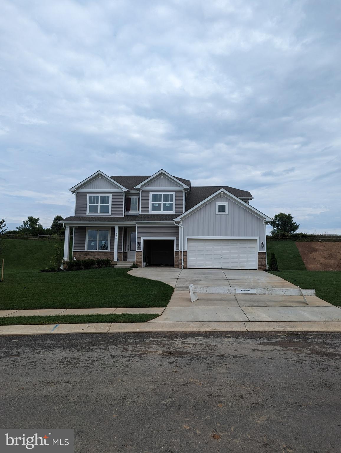 Our Jamestown sits on a beautiful, useable, oversized homesite which is conveniently located in the rear of the community on a gorgeous cul-da-sac. This home-site backs to protected forest conservations and the views of the valley go for miles! Your backyard possibilities are endless!
The house itself is a stunning new construction home plan featuring 3,880 square feet of living space, 6 bedrooms, 4 bathrooms, an upstairs family room, finished basement complete with a recreational room, bedroom, and full bathroom plus a 3-car garage. The home is everything you’re looking for without compromise.
As you enter the home into the foyer, you can’t help but notice the grand entry and 8ft front door. Upon entry, you’re greeted by the bright formal dining room with pass through butler’s pantry to the kitchen. The foyer brings you back into the open concept living space, highlighted by the roomy kitchen area and large modern island overlooking the casual dining area and living room. Tucked off the living room is a main bedroom and full bath – the perfect guest suite or home office. Upstairs you’ll find a large bonus room and upstairs laundry room, simplifying an everyday chore! There’s an additional 4 bedrooms upstairs, one being the primary suite, which highlights a huge walk-in closet and luxurious bathroom.
This home cannot be overlooked! The home is under construction and will be ready for a Summer 2023 delivery. Sales price is final price, not add ons!
Contact us today to schedule a showing and to ask about our amazing incentives!