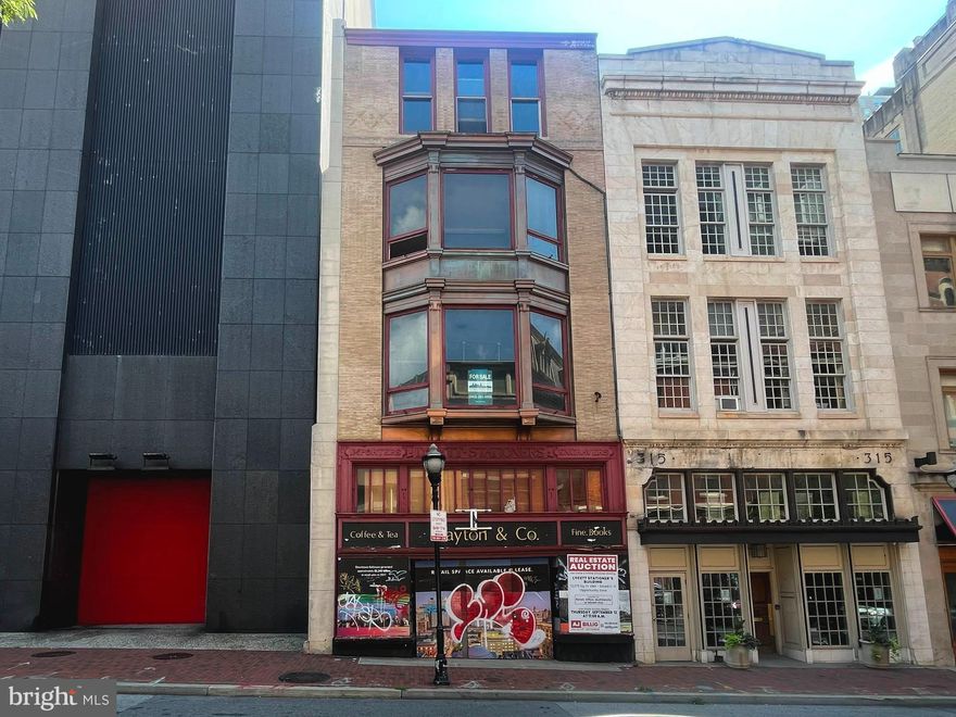 317 N. Charles Street comprises a four story in-line storefront building ready for renovation or full redevelopment. Located in the heart of Downtown Baltimore’s Central Business District just south of Mount Vernon, the property is situated in one of the highest exposure and most significant commercial and cultural areas in the City. The building has been mostly gutted, contains 12,375 square feet of gross building area on six existing levels. With a C-5 Downtown Zoning district, options for future use abound and include retail, office, multifamily or mixed-use. Being within an Opportunity Zone, development of the site retains an array of tax incentives. The building itself has the provenance many developers would seek, having been originally built and occupied by the Lycett Stationer’s Company, subsequently Downs Stationers, whose history dated back to the 1830’s. That history is included within the property’s designation on the Maryland Inventory of Historic Properties. The auction provides an opportunity to develop a piece of Baltimore City history along Baltimore’s primary commercial and cultural north-south artery.