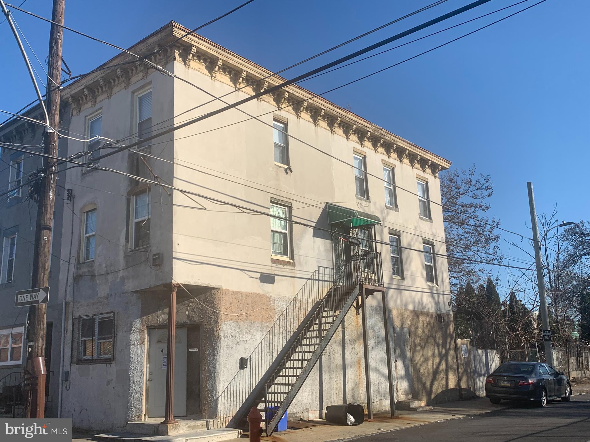 This expansive 2,304 sq ft multifamily townhouse (zoned RM-1), is situated on a 960 sq ft lot in Philadelphia’s West Kensington neighborhood, presents a prime investment opportunity. The generous floor plan contains 3 units: 1st floor is commercial (vacant) , 2nd floor is a 1BR/1BA occupied by tenant and 3rd floor is a 1BR/1BA occupied by tenant, great for a rental investment or potential resale opportunities. Located in West Kensington, the property benefits from ongoing neighborhood revitalization efforts, enhancing its long-term value.