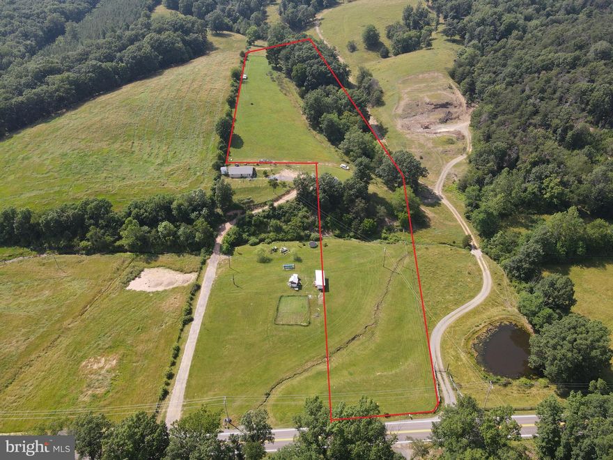 REDUCED!!!UNRESTRICTED!!! RARE 5+ ACRES, WITH STREAM, FIELD, WOODS AND VIEW. THIS PROPERTY FRONTS THE STATE MAINTAINED BLACKTOP ROAD. IT OFFERS THE OPPORTUNITY OF HAVING FARM ANIMALS, LIVESTOCK AND CHICKENS. YOU COULD BUILD YOUR DREAM HOME OR WEEKEND RETREAT IN THE BEAUTIFUL WEST VIRGINIA HILLS.