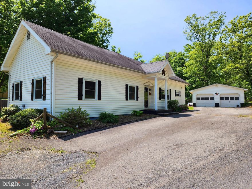 This green acre is the place for me! Creek wading is the life for me! Land spreadin' out so let's go roam! Keep Manhattan, just give me that Savage home! Come & enjoy over an acre of serene peacefulness with the relaxing sounds of the stream and plenty of room for chickens, goats or more on your partially fenced corner lot! Your 3-bedroom ranch style home features 1 full bathroom, large living room, dining area and kitchen. There is an enclosed porch area and lower-level partially finished family room for even more living space. Outbuildings, appliances (including an extra refrigerator/freezer) and woodstove all become yours when you decide this is your new home!