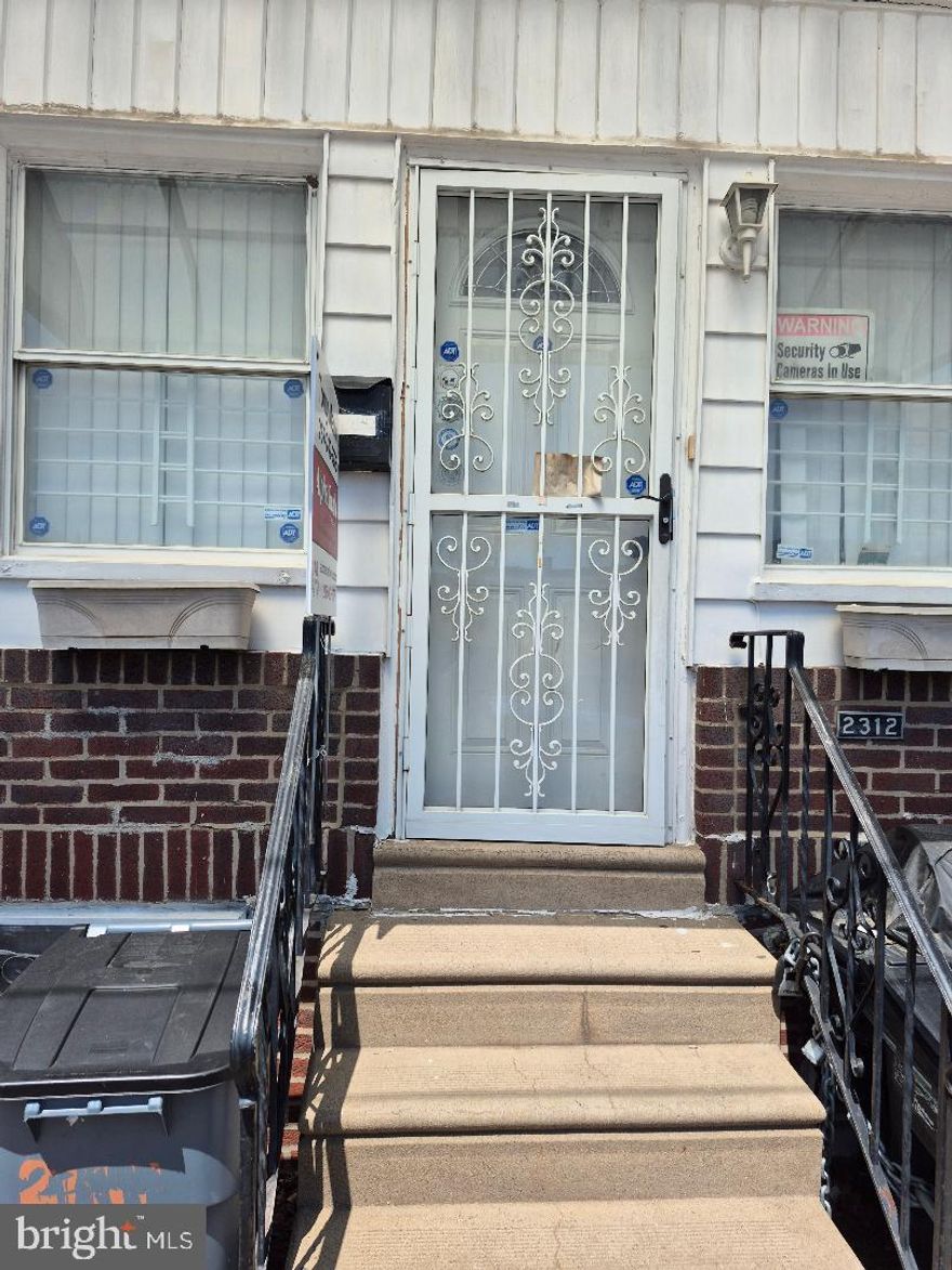 A nice street in West Passyunk section of South Philly. Open Living Room/Dining Room combo, Galley kitchen, rear yard. The basement is a full cement basement that is partially finished with a "powder room." There are 2 bedrooms and 3 pc tile bathroom. There are several upgrades and this property could be considered semi-modern. This area is one of the fastest growing neighborhood's in South Philly!