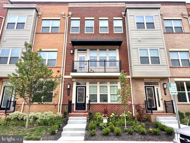 Amazing 4 Level Townhome in the Heart of Fairfax City!
This spacious and upgraded 4 bedroom, 4.5 bath residence offers a covered deck, balcony, rooftop terrace, and an oversized 2 car garage. Upon entry, you’ll find wide plank luxury vinyl plank (LVP) floors, a bedroom with full bath featuring upgraded floor and shower tiles, and a quartz countertop vanity.
Up the oak stairs, the open concept main level showcases a modern center kitchen with elegant quartz counters, a massive island, classic white cabinetry, stylish white backsplash, apron sink, stainless steel appliances, and a convenient pot filler. The great room and dining room flank the kitchen, both adorned with custom wainscoting and upgraded modern light fixtures. Enjoy seamless indoor-outdoor living with access to a balcony and a covered deck with cozy fireplace—perfect for cool evenings. Wide plank LVP floors continue throughout this level.
The third level hosts two generous bedrooms, including a primary suite with a large walk-in closet and a spa like bath featuring dual vanities, a frameless glass shower, and upgraded tile finishes. The second bedroom offers a charming bump-out—ideal as a reading nook or office—and a full bath with upgraded tiles and quartz counters. This level also includes a laundry room for added convenience.
The top floor offers a spacious loft, perfect for an entertainment space or movie nights, plus a bedroom with walk-in closet and a full bath—again with upgraded floor and shower tiles and quartz counters. Step outside to the rooftop terrace to enjoy spectacular sunrises and sunsets.
Additional highlights include an EV charger in the garage, tankless water heater, whole-house humidifier, and the option to lease furnished or unfurnished.
Fantastic location close to Route 66, Route 50, Route 29, and Route 123 (Chain Bridge Road), many restaurants and stores like Wegmans, Costco, Wholefoods, or Fair Oaks Mall!