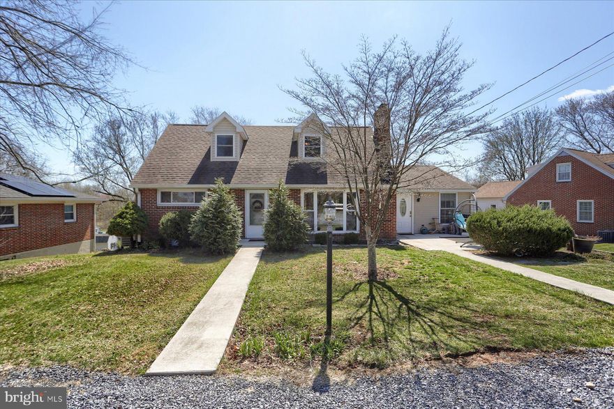 Welcome to your new home that is much more than meets the eye!   It may look cute as a button from the front, but with the addition on the back, there is over 3000 finished square feet of living space!   It's a perfect blend of cape cod charm with all the modern amenities.  If you have a large family, this home will check all of the boxes.  3 bedrooms on the first floor including an owner (or in-law) retreat that has a huge walk in closet & bathroom featuring double sinks, a walk in shower and a separate jetted soaking tub.    2 more nicely sized bedrooms, another full bath, a half bath for guests,  plenty of living room and dining space (complete with built ins and tons of windows) , a dream laundry area with lots of storage & shelving  and of course the star of the show...the incredible kitchen that rounds out the first floor. This kitchen is an absolute showstopper with a  massive center island , walk in pantry, built in desk space and a multitude of cabinet storage!   Upstairs is it's own little retreat that features 2 more bedrooms and another full bathroom.   The lower level is finished for even more space to spread out. Game room and/or Family room, exercise space complete with cabinets and sink to make gardening or entertaining really convenient.    Out back is a huge above ground pool with wrap around deck and walk in steps, a playground area, shed, 2 car garage and an extra storage room.  This is all located in the heart of Linglestown on a no outlet street close to tons of shopping, restaurants, highways and Koons Park AND a 1 year home warranty is included for peace of mind!   Schedule your showing today and be happily swimming in May!