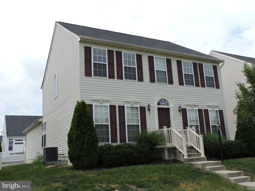 Spacious, affordable 3 bdrm, 4 bath colonial w/bsmnt &2 car garage offers hrdwd floors, 9 ft ceiliings, formal living & dining rooms, kitchen w/hardwood floors, granite counters & stainless appliances, large family room that overlooks the rear patio.2nd floor has three large bedrooms (master suite has luxury bath and walk-in closet) and 2 full baths. Bsmnt has rec room, 2nd kitchen, 2 addtl rooms!