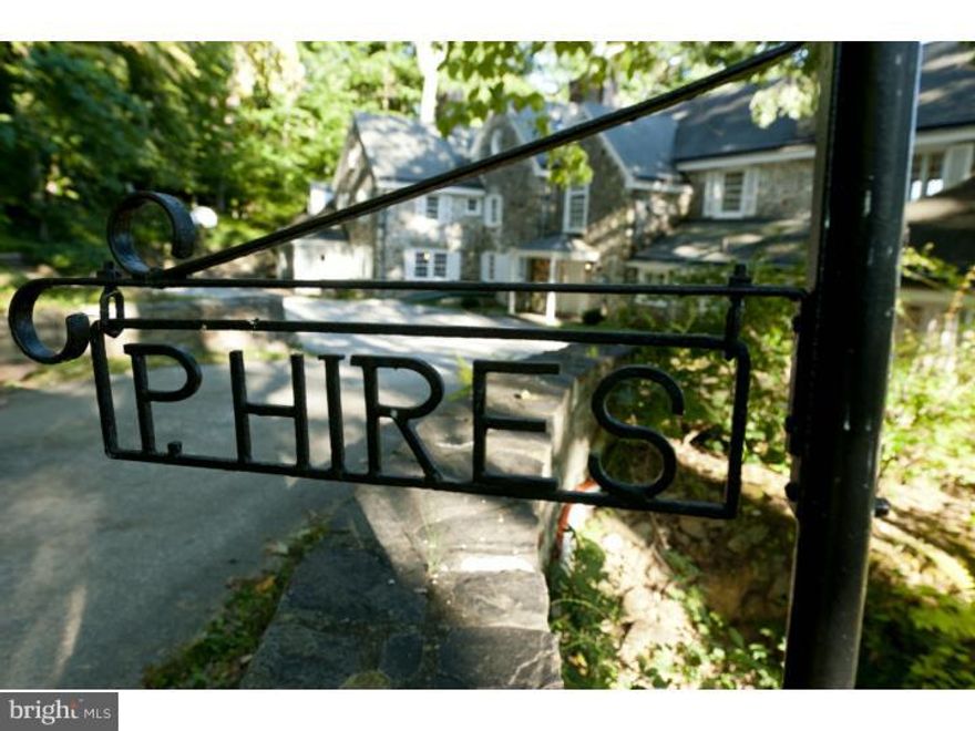 Glenilse..affectionally named after the matriarch of the family, is an exquisite estate right outside of Valley Forge Park. This magnificent 6.8 acre property has remained in the family for over 60+ years, and anxiously awaits a new loving homeowner to create as many magical memories as it has for this family over the years. From the moment you approach the property you know something special awaits you as you cross over a bridge past a spring house, and there she is.. this grand dame that quietly sits amongst mature landscaping and a setting that will take your breath away!! Surrounded in beautiful stone this gorgeous home is of a by gone era and is enhanced by exquiste architectural details both inside and out. A welcoming front to back Foyer with gleaming random width hardwood floors leads into both the formal Living and Dining Rooms that capture the picturesque backyard setting. The Living Room has floor to ceiling bookcases, millwork galor, and large stone fireplace. The lovely Dining Room also with fireplace is quite large and opens directly through French doors to a covered Porch and outside Veranda that is surround by stone walls along the entire backside of the house. A Kitchen with Breakfast Room, Butlers Pantry, Powder Room and convenient First Floor Laundry Room complete the First Floor. A gracious staircase with palladian window lead to Second Floor where you can find a Master Suite with fireplace that is streaming with natural sunlight and window seat that overlooks the pond and babbling creek. There are two additional En Suite Bedrooms both with cozy fireplaces and two more Bedrooms with Full Bath off of the back staircase. Life is good as this little slice of heaven has one of the most picturesque landscapes you will ever see with a stream, pond and naturally feed pool that graciously overlooks a truly magical setting!!