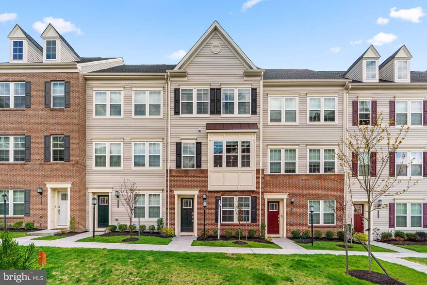 Move in Ready 4 Bedroom 3.5 Bath w/ 2 Car Attached Garage Townhome in Howard County, Hanover! The main level is light and bright with a wood floor entry. There is a flex bedroom on the main level that is a great office space or workout room with the convenience of a full bathroom on the entry level. Head upstairs to the main level which is perfectly planned for entertaining! There is TONS of natural light in this space with wood floors throughout. The gourmet kitchen will be the favorite spot in the house with a large seating island, quartz countertops, stainless steel appliances and an open seating area off of the slider to the outdoor deck! The upper level has a spacious primary bedroom with attached private bathroom equipped with double sinks and a walk-in shower! Two nice sized bedrooms and a shared hall bathroom complete this home. For added convenience, there is an attached 2 car garage with a rear entrance and private driveway in front of the garage. Utilities will be a minimal with this energy efficient, LEED certified home! The Oxford Square community offers an in-ground, outdoor swimming pool, a fitness center, clubhouse, jogging / walking trails, and more! Hanover Hills Elementary School and Thomas Viaduct Middle School are both located within walking distance in the community, where you'll find basketball courts and playgrounds! Also located inside the community is a local coffee shop, hair salon, and Little Eggs Daycare Center. Just one exit away on route 100 is the Arundel Mills shopping center with plenty of restaurants, shopping, Maryland Live Casino, grocery stores, everything you could need! Also within a very short drive is Fort Meade, NSA, Northrup Grumman, and more. This community is conveniently located within minutes of the Dorsey MARC train station for easy commuting, as well as the BWI commuter train which will take you to your destination with ease!  You will LOVE living here!