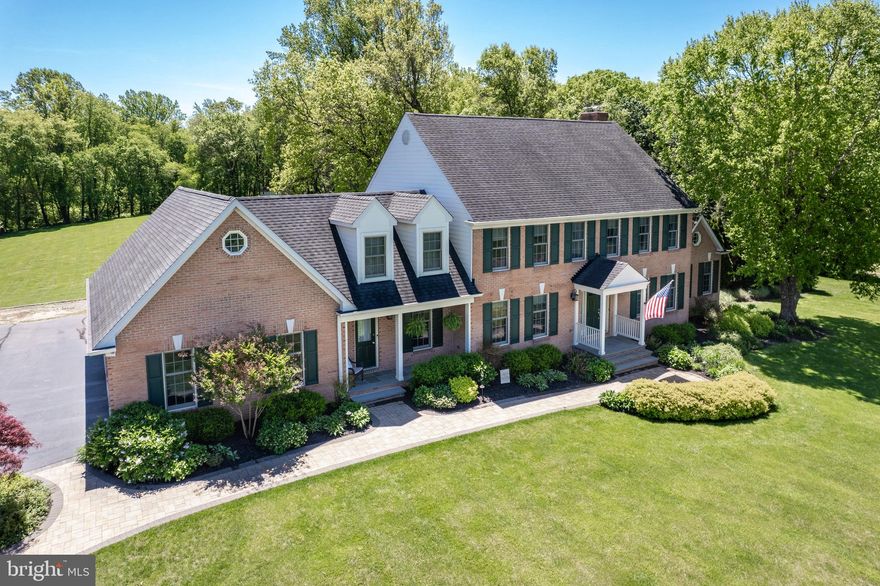 Professional pics coming soon!
Welcome to 872 The Old Station Court, a magnificent 5-bedroom, 2 full and 2 half bathroom colonial home situated on over 3 private, beautifully landscaped acres in sought-after Howard County. This impressive residence offers over 4,700 square feet of living space and features a 3-car side-loading garage for added convenience. The main level greets you with elegant hardwood flooring and a main level bedroom boasting a separate entrance, perfect for guests or multigenerational living. Step into the inviting formal living room, which flows seamlessly into a sunroom with a soaring cathedral ceiling and luxury vinyl flooring, creating a bright and airy retreat. The spacious family room features a cozy pellet stove and walk-out access to a huge deck, ideal for indoor-outdoor entertaining. The heart of the home is the well-appointed kitchen, showcasing tile flooring, quartz countertops, a dining area, and a generous walk-in pantry. Completing the main level is a convenient half bathroom and a laundry room. Upstairs, discover four spacious bedrooms, including a huge primary suite with dual walk-in closets and a luxurious en-suite bathroom featuring dual sinks, a soaking tub, and a large tiled walk-in shower. The newly updated hall full bathroom offers a tiled shower and two sinks, while three additional bedrooms provide ample closet space. The fully finished lower level is highlighted by recessed lighting throughout, a half bathroom, and walk-up access to the backyard oasis. Enjoy year-round comfort with dual-zoned HVAC and a whole-house water treatment system. The backyard is a true paradise, featuring a concrete saltwater pool set on a picturesque, tree-lined, flat 3-acre lot—perfect for relaxation and recreation. This exceptional property is ready for its next owners and would prefer to settle at the end of August