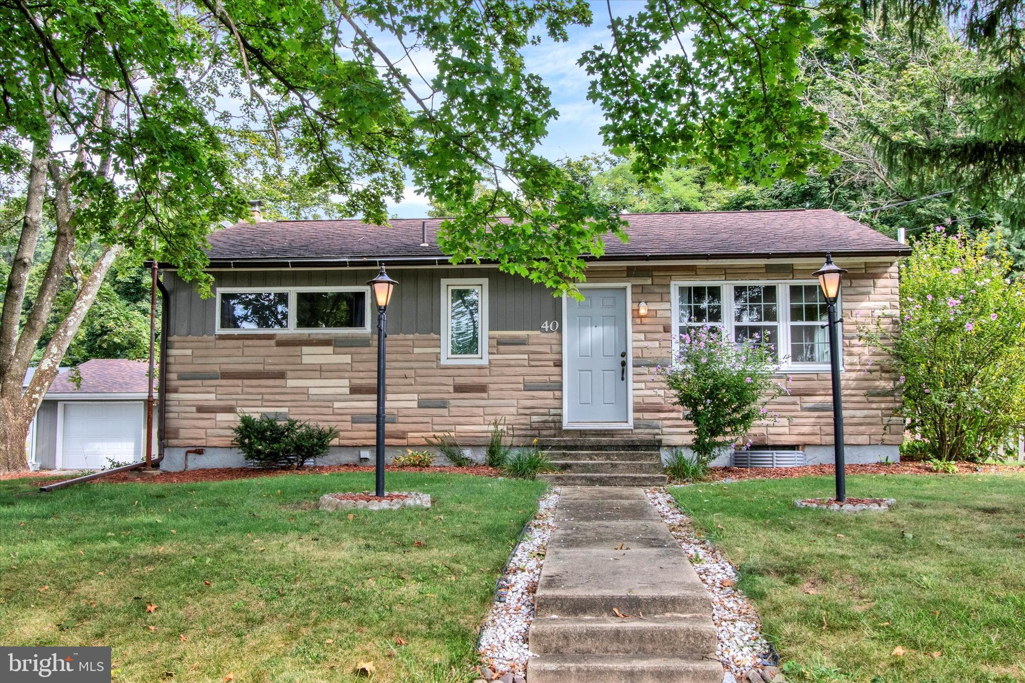 Come see this great 3 bedroom, 1 bath ranch home with a 2-car detached garage in Oley Valley School District! This home has great curb appeal, located on a large .64 acre corner lot with a side entry driveway. The fenced backyard has a park-like setting complete with a covered back porch, firepit area, and raised garden bed. Inside, you will love the family room addition that looks out to the backyard with newer flooring and a pellet stove to keep everyone warm this winter. The eat-in kitchen has also been updated, and flows from the family room and into the large living room. Down the hallway you will find 3 nicely-sized bedrooms and a full bathroom. On the lower level there is also a spacious basement with plenty of storage that can easily be finished for even more living space. And of course, the 2-car detached garage which is oversized with a workshop area and more storage! Other notable features of this great home include: a new garage roof (2024), new hot water heater (2025), a recently cleaned pellet stove chimney (2025), and an above ground pool that just needs a little bit of work to be ready for next summer. So set up your showing today! **We have received multiple offers for this property. The seller has decided to set a highest and best deadline for Monday, September 22nd, at 1pm.**