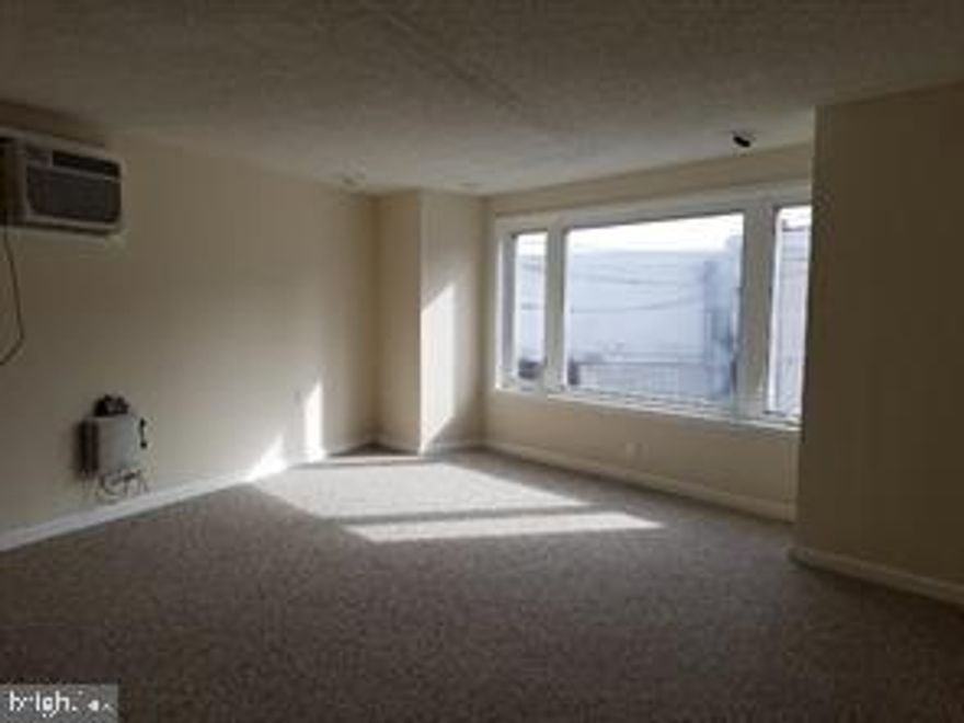 This property is zoned commercial so it's usage could also be rented as a small business space. Renovated kitchen and bathroom. Freshly painted with shampooed carpet in Great Room and Bedroom. It's the perfect location. Located in the center of town.  Convenient to public transportation, restaurants and stores.