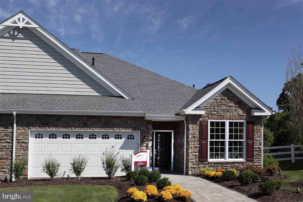 Make this your Dream Home! 3bed/3bath Adams II Home. Open floor plan with added Sunroom & gas fireplace. Chef?s Kitchen includes island & granite countertops. Hardwood & ceramic tile flooring in select areas. Private 2nd level w/bed, bath, & loft. Luxurious Clubhouse w/5-Star Amenities! No yard work! Model Photos.