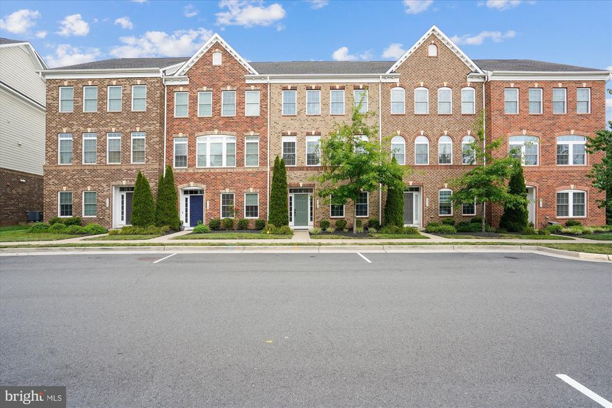 Immaculate 10-year-young townhouse located on a quiet street in super location, with easy access to transportation, dining, and shopping.  A 2-car garage! The home features 4 bedrooms and 3.5 bathrooms, including an entry-level office/ den, plus a full bath. The main level features 9-foot ceilings, a gas fireplace, hardwood floors, powder room and an open layout with flexible space for living and dining.  The kitchen includes a large island, gas cooktop, wall oven, and built-in microwave.  Enjoy sitting on the rear deck. The primary suite includes a walk-in closet, tray ceiling, and ample natural light. The en-suite bath features marble counters, dual sinks, granite countertops, and a double showerhead. Rear-facing windows in the primary bedroom and bath have added soundproofing for comfort.  The laundry room is conveniently located on the bedroom level. The house has been wired for Bluetooth sound system..