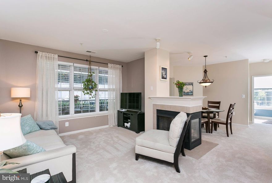 Rarely available corner 3bd/2ba unit facing pool and woods with easy accessibility from garage and outside. All new GE appliances, new carpet, fresh paint and California closets in all bedrooms.  This unit is spacious and private.  Enjoy all the amenities including tennis courts, fitness center, movie theater, lounge, concierge, community events, library, card room and cafe.