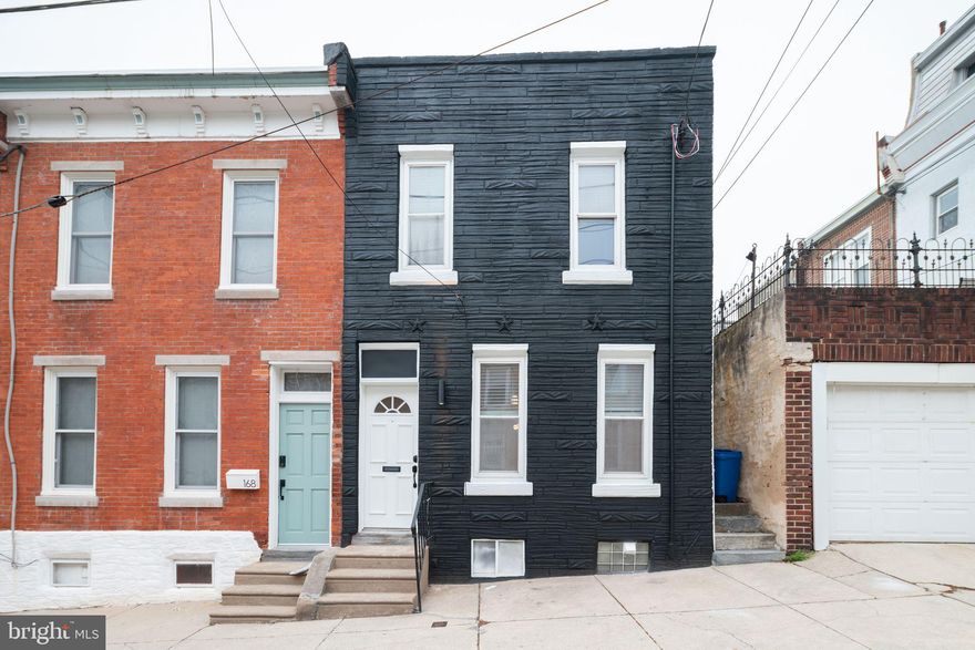 Welcome to this stunning rental in the vibrant Manayunk neighborhood of Philadelphia! This beautifully renovated 3-bedroom, 1.5-bathroom home offers a rare opportunity to have modern comfort just steps from the heart of Manayunk. Step inside and be greeted by brand new flooring that seamlessly flows throughout the entire home, creating a warm and inviting atmosphere. The heart of the home is the stunning new kitchen featuring elegant white shaker cabinets adorned with sleek brushed gold pulls, new stainless steel appliances, a crisp black subway tile backsplash, and white cararra quartz countertops. The main level also boasts a brand new half bath, adding a touch of luxury and functionality to your daily routine, a large living and dining room space with plenty of natural light, and a massive private backyard for relaxing and entertaining. Upstairs, discover three large bedrooms, ample closet space, new hardwood flooring and more natural light. The newly renovated full bathroom upstairs offers a beautiful new vanity with storage, black accented fixtures, new flooring, new tub and toilet, and gorgeous large format gray tile. Revel in the comfort of this brand new home, and be the first to experience this new rental property. Close proximity to Main Street Manayunk, multiple train stations, Wissahickon park, and everything else Manayunk has to offer. Don't miss the opportunity to call this meticulously renovated property your home. Schedule your showing today!