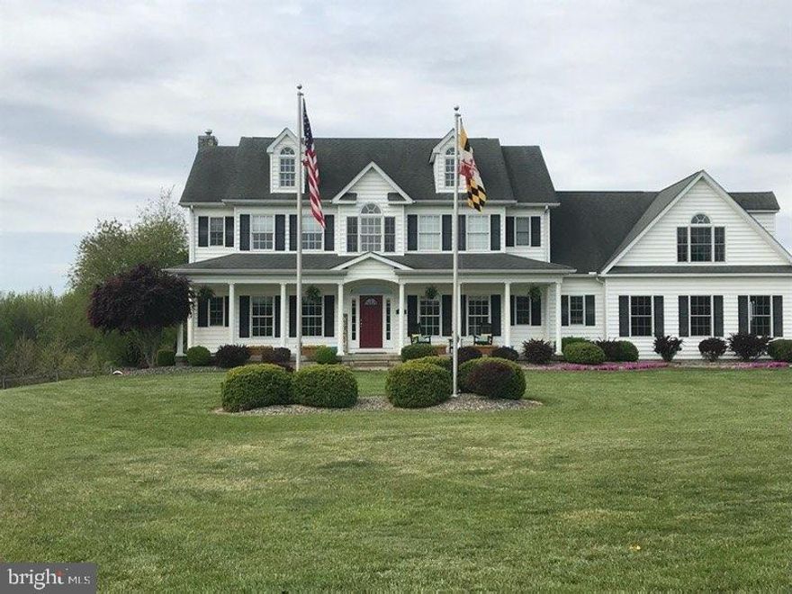 Stunning 4000 sq ft colonial located on 2 acres  just 20 minutes from ever-expanding Middletown, DE's restaurants, shops, healthcare and other amenities.  Enjoy the privacy and tranquility of being surrounded by farmland with perfect views of both the sunrise from your front porch and the sunset over rolling hills from your four season sun room. A perfect home for entertaining, the eat in kitchen is wide open to the living room and the enclosed back porch for as large a gathering as you desire. Very unique loft looking down over den / family / recreation space.  Formal dining room and first floor office complete the offering.  Multiple opportunities to add a fourth and fifth bedrooms on either the main or upper level.  Meticulously cared for home has had recent updates to the kitchen and living areas. The full basement has high ceilings, walks out to the rear fenced yard and offers a roughed in bath for your possible build out.   There are 4 indoor parking spaces between the attached and detached garages.