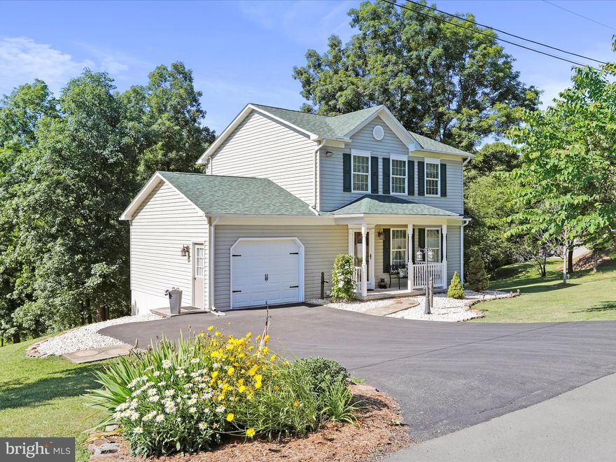 Welcome to Windover Hills!! This traditional style home backs to the woods for a great location with the privacy you're wanting! The main level has a beautiful kitchen with a large dining area and deck right off the kitchen, a half bath, laundry and access to the attached garage. Upstairs features 3 bedrooms and 2 full bathrooms. Your primary bedroom features 1 of your baths with huge double closets. With the partially finished walk-out basement, you will have plenty of storage or and awesome living/entertainment space.