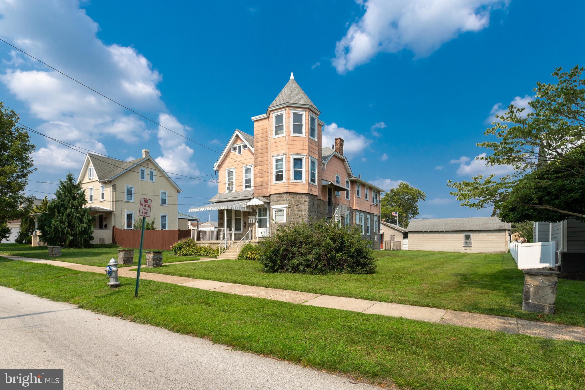 This charming Victorian triplex blends classic appeal with income potential, ideal for owner-occupants or investors. Set on a rare oversized lot, it offers ample outdoor space for gardening, recreation, or future expansion. The home includes three units: two 1-bed/1-bath apartments—great for steady rental income—and a spacious 2-bed/1-bath unit on the first floor, perfect for owner occupancy. A standout feature is the 5-car detached garage, offering storage, parking, or even additional rental potential. Combine that with the oversized lot, and you have an incredibly flexible property that’s hard to find. Located in a quiet, well-maintained neighborhood near the local police station, the property offers added peace of mind and convenience—just minutes from schools, shopping, dining, and commuter routes. Ideal for house hackers, first-time buyers, or anyone looking to build equity while living affordably. Sold as-is through an estate sale.
