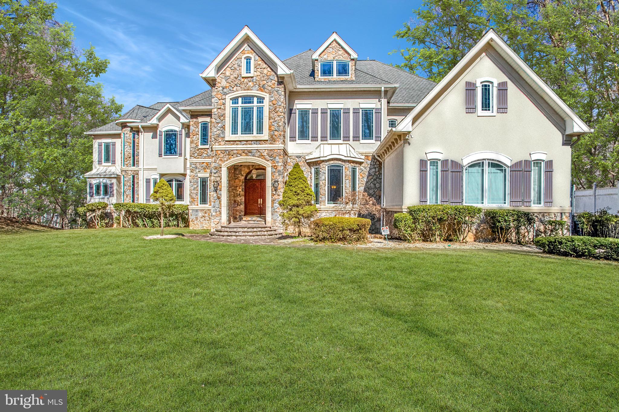 Discover the peace and serenity of waterfront luxury living in this stunning masterpiece, nestled on a serene 2.41-acre lot at the end of a peaceful cul-de-sac in McLean, Virginia. This luxury home offers incredible views of the Potomac River and boasts every modern comfort you expect. With 7 spacious bedrooms and 6.5 bathrooms, this residence is designed for both relaxation and entertaining. The heart of the home features a grand multi-story living room with beautiful views, surround sound, an inviting fireplace, and abundant natural light. A large dining room is perfect for dinner parties and events. A gourmet kitchen equipped with stainless steel appliances, a six-burner stove, and a butler's pantry is perfect for culinary enthusiasts. The open floor plan seamlessly connects the family room, adorned with another cozy fireplace, to the breakfast area, creating a warm gathering space. Retreat to the main-level primary suite, complete with a lavish soaking tub and walk-in closet, or explore your adjacent two-story mahogany wood office and library complete with a winding connecting staircase. A grand staircase with an overlook to your great room allows grand formal entrances for gatherings and peaceful retreats upstairs to four additional bedrooms with large closets and en suite bathrooms. Unwind in the fully finished basement, which includes a fully operational screening room, an indoor sauna, a gym, a games room, additional living space, and a second kitchen for hosting guests. The walk-out basement also boasts River views and ample natural light. Elegant touches like crown moldings, wainscoting, and hardwood floors enhance the home's appeal. Step outside to enjoy the breathtaking views of the Potomac River, where private access allows for fishing, kayaking, and swimming. Or picture yourself enjoying waterfront dining on your private deck overlooking the River. The beautifully landscaped front yard complements the home's exterior with elegant fencing. With a three-car garage and additional driveway parking, convenience is at your fingertips. The owners have hosted dignitaries, business executives, politicians, and many other notable guests over the years. The unparalleled views and private yet convenient location allow for peaceful living and gracious hospitality. Buyers are welcome to request any color and design preferences to be completed prior to closing.