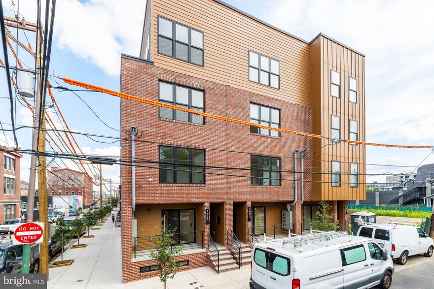 Exceptional new construction triplex located in the heart of Olde Kensington, one of Philadelphia’s most desirable and fast-growing neighborhoods. This corner building is part of a collection of six newly built multi-family properties and offers an incredible opportunity for investors or owner-occupants seeking strong rental potential and modern design. Directly beside an exciting new construction block featuring 18 single-family townhomes as part of the Randolph Courts new development.

Unit 1:
A 2-bedroom, 2.5-bathroom residence featuring a private front porch and spacious backyard, perfect for entertaining or relaxing outdoors. The open layout includes a contemporary kitchen with custom cabinetry, quartz countertops, and stainless steel appliances, combining functionality with refined style.

Unit 2:
A bright 2-bedroom, 1-bathroom flat with an open floor plan, modern finishes, and a private balcony—ideal for renters seeking comfort and convenience.

Unit 3:
A stunning bi-level penthouse offering 2 bedrooms, 2 bathrooms, and a dramatic mezzanine level with soaring ceilings. The highlight is the private green roof deck boasting panoramic city views—a truly rare feature in this price range.

Each unit is equipped with high-end finishes, stainless steel appliances, and modern open layouts that maximize natural light. The property includes a 1-year builder warranty and qualifies for the full 10-year tax abatement, providing both peace of mind and excellent long-term value.

Surrounded by other successful new developments and strong rental demand, with easy access to Northern Liberties, Fishtown, and Center City, this property represents an outstanding investment opportunity in one of Philadelphia’s most dynamic neighborhoods.