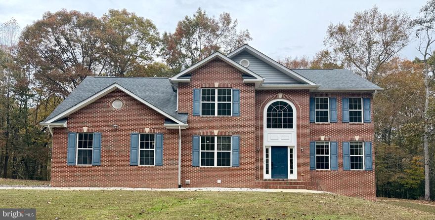 No Homeowners Association - No Restrictions - Nestled in the serene enclave of Covington Pointe, this exquisite detached residence with basement in-law suite embodies the perfect blend of contemporary elegance and timeless colonial charm. Set on a sprawling 5.72-acre lot, this property offers a luxurious lifestyle surrounded by tranquil wooded views, creating an idyllic retreat from the hustle and bustle of everyday life. Step inside to discover a thoughtfully designed interior that radiates warmth and sophistication. High-end appliances, including a built-in microwave, dishwasher, and stove, cater to the culinary enthusiast, while the spacious layout invites natural light to dance across the elegant finishes. The traditional floor plan enhances the sense of space, with a cozy family room off the kitchen, perfect for gatherings or relaxing evenings by the fireplace. The inviting ambiance is further complemented by the rich textures and quality materials throughout, ensuring comfort and style at every turn. Retreat to the fully finished basement, a versatile space that can be tailored to your lifestyle needs - be it a home theater, gym, additional living area, or an in- law apartment. With both interior access and an outside entrance, this area offers endless possibilities for leisure and entertainment. Outside, the property boasts a charming balcony and expansive deck, ideal for savoring morning coffee or hosting summer barbecues while soaking in the picturesque views of the surrounding trees. The meticulously maintained grounds provide a peaceful sanctuary, perfect for unwinding after a long day. Convenience is paramount with an oversized side-entry garage that accommodates two vehicles, along with ample driveway space for guests. The property's rural location ensures privacy while still being within reach of local amenities, making it a perfect blend of seclusion and accessibility *** Walking trails through the woods would be perfect for ATV recreation *** This home is not just a residence; it's a lifestyle choice that offers a unique opportunity to embrace luxury living in a tranquil setting. Experience the harmony of nature and refined living in this exceptional property, where every detail has been curated for comfort and elegance.