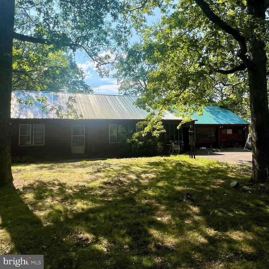 Great rancher on 3+/- acres on Cherry Run. three bedrooms 2 full baths on full basement.