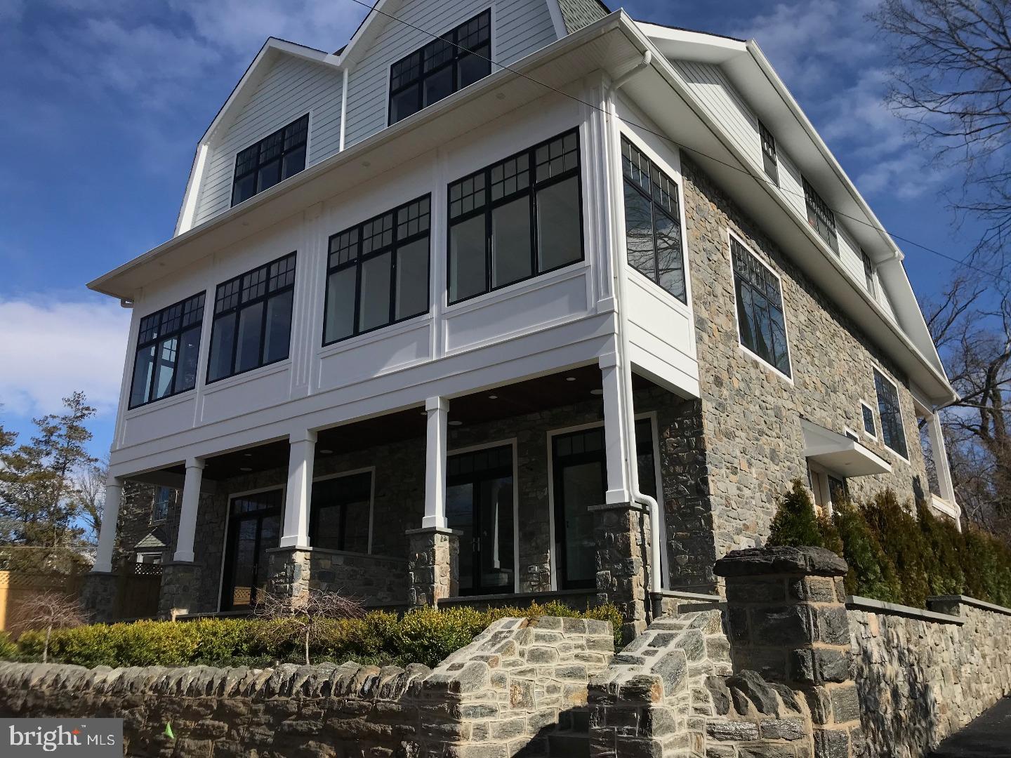 Introducing Shawnee Place ? A very special collection of 2 new townhouses in premier Chestnut Hill location that seamlessly nestle into the neighborhood as if they were built decades ago. Traditional architecture coupled with a modern floor plan make these 4 BR/3.5 BA top of the hill homes perfect for today's living. Developed by Philadelphia Design Home Builder 2014 these 3600 square foot homes are constructed with the highest quality building materials. Sprawling second floor open-concept living floor with over 1200 square feet of luxe living space. Large Chef's Eat-in Kitchen with 10 foot island with carrara counter tops, Sub-Zero/Wolf appliance package, 59" custom white cabinetry, navy blue island and wet bar perfect for entertaining. Custom built-in seating area in front of large window is perfect for daily dining. Step-out balcony. Large dining room with gorgeous mill work. Massive front living room with gorgeous coffered ceiling, optional gas fireplace and gorgeous open views of classic stone Chestnut Hill houses and leafy trees through huge windows. Upstairs enter into a luxe master suite in the front of the house with vast open views. Master Bathroom features a step-in shower with frame less glass doors and steam shower. Custom double vanity. Master BR with custom mill work, walk-in closet with custom built-in closet system. 2 additional guest BR's on the opposite end of the floor with full bathroom plus convenient laundry room complete this floor. Entry floor features a grand foyer, 4th BR with French doors leading to a lovely front porch with mahogany ceiling. Full bathroom. This would make a great in-law or au-pair quarters or a perfect home office. 2-car rear attached garage. Short walk to the shops and restaurants on Germantown Avenue, train lines and Fairmount Park trail entrance. 10 year property tax abatement and many green features make these fabulous homes very efficient and low maintenance. 25 minutes to Center City, easy access to the suburbs and highways. Premier location-Exceptional Quality-Perfect Size