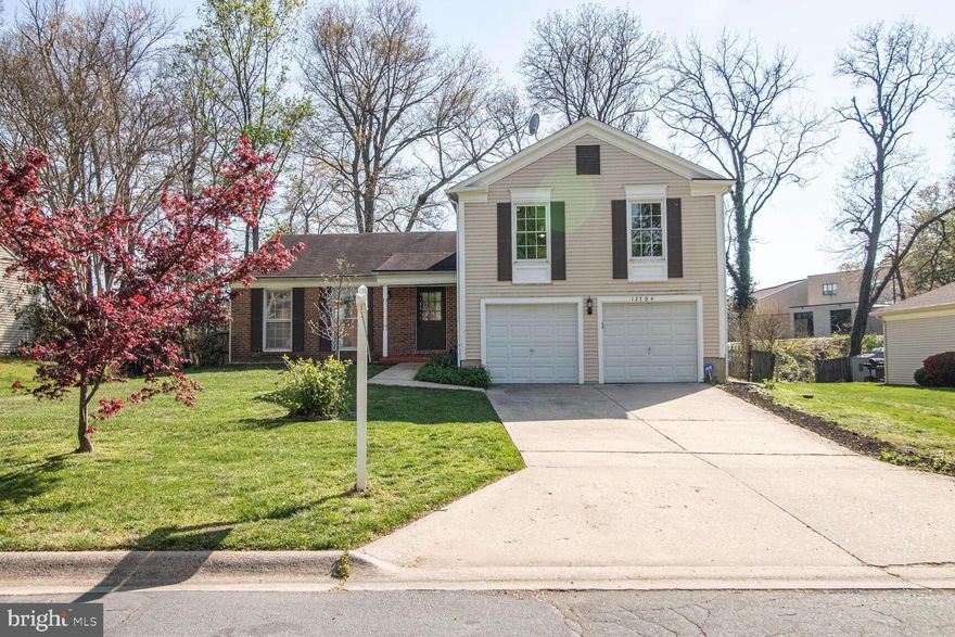 There's value to be had! Make this your future dream home in the sought-after Snowdens Mill subdivision! While the Sellers acknowledge the home needs lots of work, this spacious 4-bedroom, 2.5-bath split- 4 level diamond-in-the rough,  offers room to grow, personalize, and significantly increase in value and investment. Sellers have already installed brand-new plush carpeting across three levels and freshly painted throughout. There is a partially finished basement with stylish tile flooring. The kitchen features a brand-new stainless steel refrigerator and dishwasher, while the upper-level windows were replaced bringing in plenty of natural light. Upstairs there is a generous primary suite with a walk-in closet and private bath. Cozy up by the brick wood-burning fireplace in the family room or host unforgettable gatherings on the expansive deck with pergola, overlooking a large, level backyard and handy storage shed. With nearby shopping, entertainment, and access to numerous employers in the local area as well as  public transit, this home can be as convenient as it is charming! Please note, the home has solar panels.