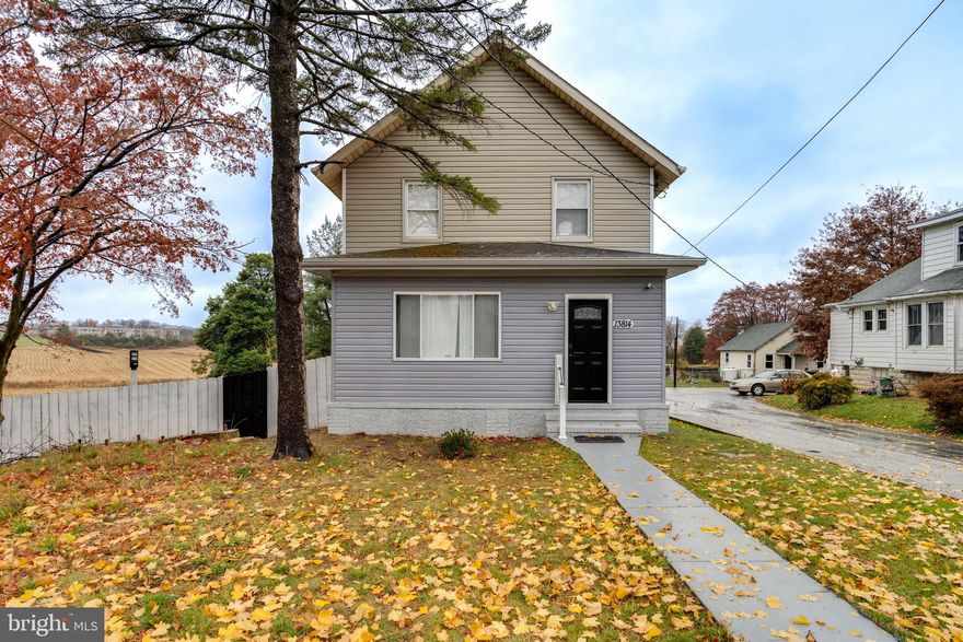This property, situated on half an acre of flat and fenced land, offers all the updates that provide comfort and quality living. Hardwood floors throughout the house, professionally painted, "ready to move in." The central heating was updated in 2021, adding two A/C units for the entire house, and the septic system was pumped in 2023. The house is in good condition and meticulously maintained.
Right at the main entrance, you'll find a small sitting room and a den ideal for a home office. The first floor features an integrated floor plan with a living room, dining room, kitchen, half bathroom, and a spacious deck covered and illuminated with solar power. The kitchen boasts wooden cabinets and stainless-steel appliances. On the second floor, there are four bedrooms and a remodeled bathroom with a separate jetted tub and shower.
The basement includes a bedroom, full bathroom, laundry, and an independent exit. Outside, there are two structures. One is a former car garage with front and side entry doors, currently  framed and with the potentiality as an ADU.  The second structure is a shed at the end of the long driveway.
This property has endless possibilities and qualifies for all types of loans, including FHA, Conventional, VA, and the Rural Development Loan, also known as USDA.