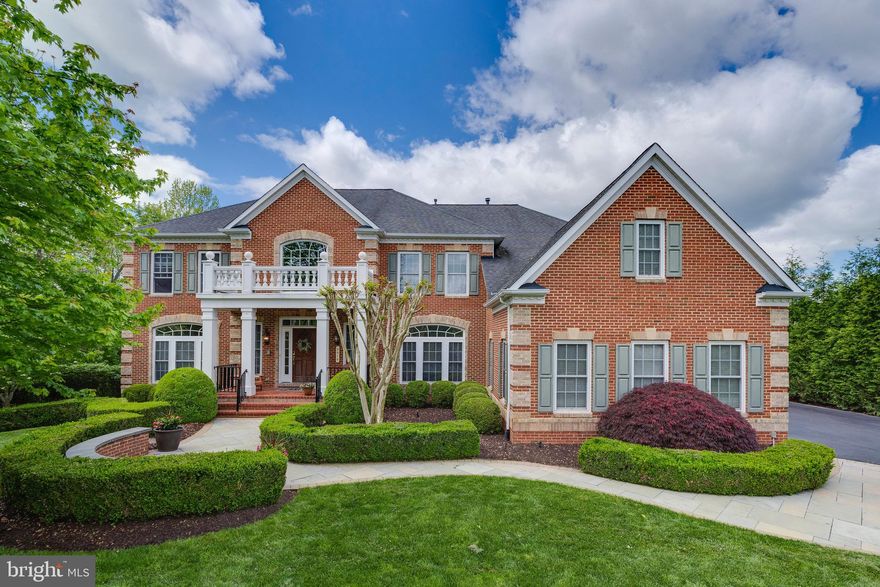 Stunning NV Homes Monticello Model features bright and airy open concept living with 5 bedrooms, 5.5 bathrooms, and 7,383 total square feet of living space across three levels. This fully loaded home is an entertainers dream both inside and out. Fresh paint throughout the entire home, new hardware, and brand new carpet. The main level consists of two-story foyer with custom chandelier, formal living/dining rooms, office with built-ins, half bath, and mud room with dual washer/dryers. The gourmet chef's kitchen features a spacious island with bar seating, high end stainless steeling appliances, 6-burner gas stove, wine fridge/wet bar, and landing desk for all your daily organizational needs. Bright and airy breakfast room overlooks the picturesque backyard. Two story family room with coffered ceilings, floor to ceiling windows, and a fireplace with built-in wood surround. Upstairs you will find a spa-like owner's suite with sitting room and en suite bathroom plus three additional bedrooms all with their own en suite bathrooms. The lower level is the perfect space to host guests with dual family rooms, expansive wet bar/wine fridge, bedroom, and full bathroom. Outside the deck, patio with pergola, and outdoor fireplace is the perfect spot to relax and unwind. Sited on a 1.23 acre park-like lot that Casey Samson say "is a true garden paradise with Vienna's finest landscaping!" Boasting a fully fenced in backyard, expansive deck, patio, outdoor fireplace, swing set, wood chopping site, and 21-zone irrigation system. This home is located in the located in the top rated Westbriar/Kilmer/Marshall Pyramid and a short drive from downtown Vienna, Tysons Corner, Reston Town Center, and local commuter routes.