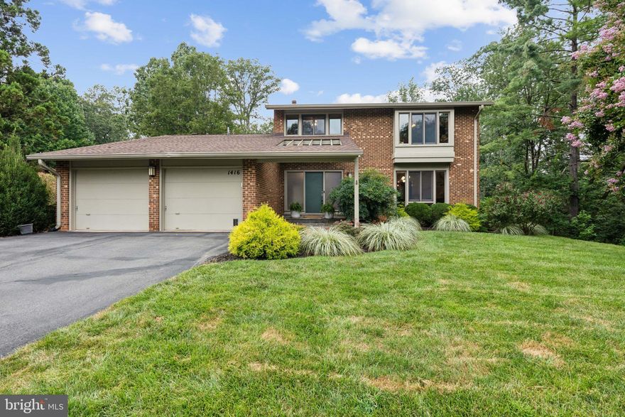 Tucked away on a premium, secluded lot that backs to mature trees, this beautifully maintained 4-bedroom, 3.5-bathroom contemporary offers the perfect balance of peace, privacy, and convenience. Completely turn-key, with over 3,000 square feet of stylish living space and thoughtful updates throughout, this home is an entertainer’s dream inside and out.

Step outside and discover your own private backyard oasis. The expansive outdoor living space includes two levels of decks, a recently installed in-ground heated pool, and a lower-level patio—all surrounded by lush greenery and the calming backdrop of protected wooded common space. Whether you’re hosting a summer pool party, relaxing under the stars, or enjoying a quiet morning coffee, the outdoor spaces provide the ultimate setting for year-round enjoyment. The stone front porch adds to the charm and curb appeal, while the large lot offers room to spread out, garden, or simply soak in the serenity.
Inside, this home shines with fresh updates and abundant natural light. The main level features new floors, a bright and spacious living room with floor-to-ceiling windows, and a dining room with sliding doors to the upper deck. The fully-renovated, open kitchen boasts upgraded appliances (including induction cooktop), quartz countertops with waterfall edge, a breakfast area, and views of the wooded backyard. The kitchen opens to a cozy family room with a gas fireplace, ideal for entertaining or everyday living. A convenient main-level half bath and laundry room complete the floor.

Upstairs, the large primary suite features two walk-in closets and an updated en-suite bath. Three additional generously sized bedrooms and a hall bath provide plenty of space. The finished walk-out lower level includes a large recreation room with double glass doors leading to the patio and pool, a full bath, and a huge unfinished area with full daylight windows, providing potential for a fifth bedroom.

Additional upgrades include brand new lighting throughout, a new electrical panel able to support an EV charger, and new sewer line. The exterior is low-maintenance with classic brick and durable Hardie Board siding. 

Located in a quiet, established neighborhood adjacent to Wolf Trap National Park for the Performing Arts, this home offers easy access to the Silver Line Metro, Tysons Corner, the W&OD Trail, and Vienna’s charming shops and restaurants. The community features nature trails, including walking access to Wolf Trap, as well as tennis and basketball courts.  Zoned for highly sought-after Langley High School.
2.25% VA assumable loan for VA-eligible buyers!

This is more than just a home; it's a peaceful retreat and the perfect place to create lasting memories.