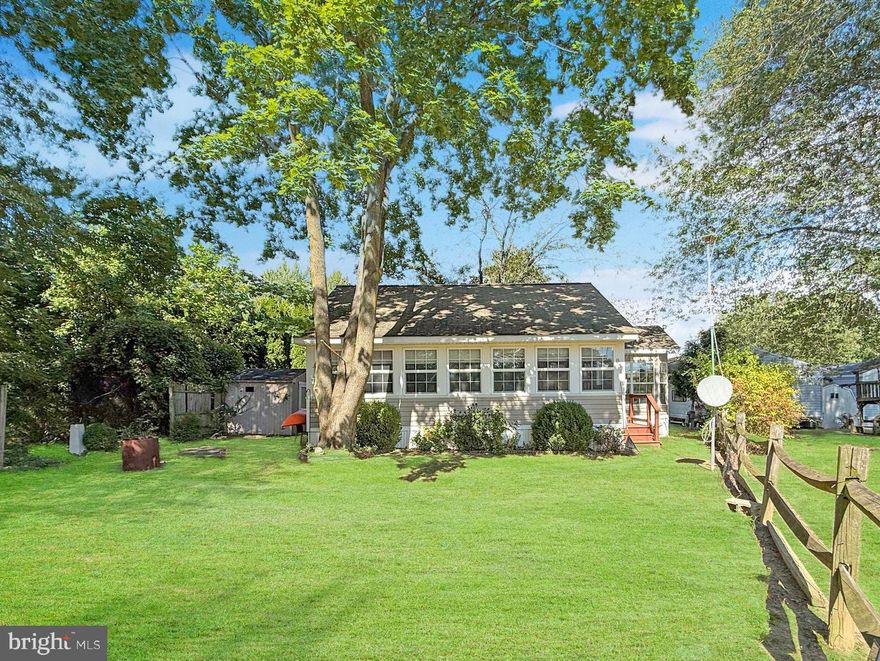 Discover your perfect getaway at Indian Acres Campground, a charming gated community offering a unique opportunity to own this 2005 Breckenridge LC Park Model situated on a spacious deeded single lot. This property is in excellent condition and move-in ready, featuring a 17x35 addition with a propane fireplace and attic access—perfect for extra storage or seasonal use. Inside, you’ll find a nice-sized living room just off the kitchen. The kitchen offers plenty of cabinet space, a full-size refrigerator, gas range, and a double sink—ideal for comfort and convenience. Relax in the large great room and enjoy the peaceful surroundings of Indian Acres. A storage shed is also included. As part of this one-of-a-kind community, owners enjoy up to 150 days of use per year (no more than 100 consecutive days) along with access to fantastic amenities including multiple pools, a boat ramp to the Sassafras and Chesapeake Bay, a pier, ponds, a lake, ball fields, open common areas, a convenience store, an arcade, and a tot lot. With an annual Community fee of $2,780 and membership required, Indian Acres offers a secure, close-knit environment ideal for relaxation and recreation. Come see this beautiful property and start making memories at Indian Acres!