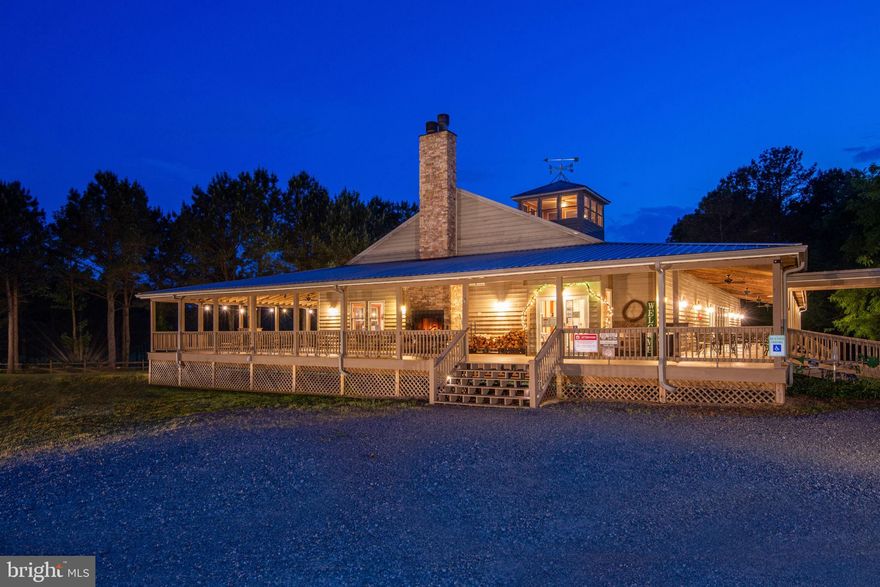 Good Luck Cellars, in Kilmarnock, Virginia is one of the premier wineries and event venues on the Northern Neck of Virginia and the entire Chesapeake Bay Wine Region. The vineyard is set upon a vast pastoral landscape which is bordered by Norris Prong and features several water features and ponds. Good Luck Cellars is a gathering place which draws from the communities of Kilmarnock, Irvington, White Stone, Tappahannock, Wicomico Church, Reedville, Urbanna, Gloucester, Mathews, Williamsburg and beyond. It is not uncommon to find patrons from Virginia Beach, Richmond, Northern Virginia and beyond. As a gathering place for friends, family, weddings, celebrations and for relaxing afternoons on the veranda, "Good Luck" has established itself as one of the premier wineries and event venues in Eastern Virginia. There is always something going on at Good Luck Cellars. The vineyard encompasses 25 acres of well cultivated vines, including: Petit Verdot - 4ac, Voignier - 2ac, Chardonel - 4ac, Cabernet Sauvignon - 3ac, Vidal Blanc - 1ac, Vignoles - 2ac, Traminetts - 1ac, Cabernet Franc - 1ac, Chambourcin - 1ac, Seyval Blanc - 1ac, Norton - 4ac, Chardonnay - 1ac. The offering of Good Luck Cellars for Purchase is a Turn-Key Offering. Winery, Tasting Room, Wine Production Building with Garage, Office and 2 br apartment encompasses 11,800 sq. ft, with a Tractor and Farm Equipment Building encompassing 1,860 Sq. Ft. GLC's West Bldg encompasses 6,000+ sq. ft. with vineyard managers apartment, cold wine storage & more. 13+ vineyard dogs, (who are celebrities in their own right), patrol the vineyard day and night. Canine amenities include 4 dog condos and invisible fencing througout the vineyards. The offering of Good Luck Cellars presents the buying opportunity of a lifetime to purchase a turn-key, award winning winery on the highly sought after Northern Neck of Virginia. Offering includes all winery and business related furnishings, fixtures, and equipment. Wine Inventory not included.