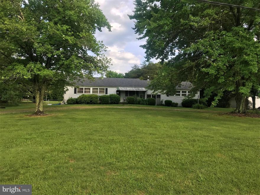 Investor Special! Rambler with a basement and garage on 1.5 acres in White Plains! Great opportunity for an investment property or sweat equity home!