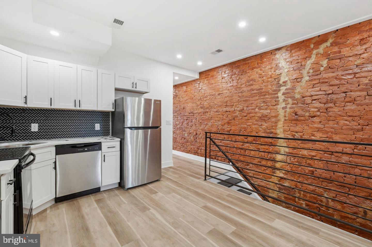 **Welcome to this fully renovated duplex, where modern finishes meet timeless charm.**
Both units have been thoughtfully updated from top to bottom just this year, offering a blend of style, comfort, and functionality.
Apartment 2 has never been lived in and features a two-bedroom, one-bath layout with a bright and open design. Step inside to a striking exposed brick accent wall, adding warmth and character to the living area. The kitchen is a showstopper, complete with white shaker cabinets, a bold contrasting backsplash, and brand-new stainless steel appliances—including a refrigerator, dishwasher, oven, and microwave. For added convenience, you’ll also enjoy a garbage disposal and sleek, modern fixtures throughout. The bathroom is equally impressive, featuring elegant marble tile, matte black fixtures, and a clean, modern design that ties the space together beautifully.
With its fresh renovations and move-in ready appeal, this home is perfect for anyone seeking both comfort and luxury.
Don’t miss your chance—schedule a showing today!