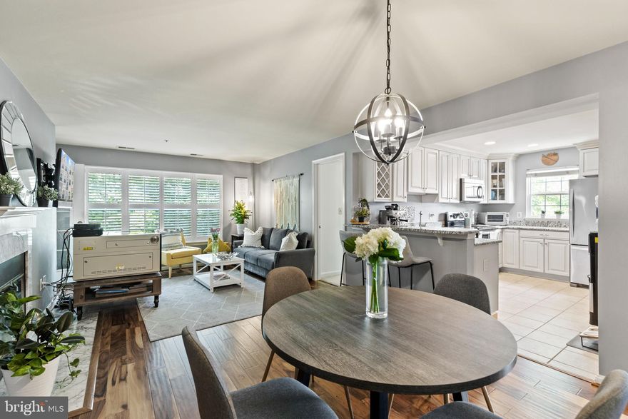 Click the Virtual Tour link to view the 3D walkthrough. Beautifully renovated 2nd-floor condominium that backs to Quarry Pond Park. Engineered hardwood flooring throughout the main living area and travertine tile in the kitchen are both a breeze to maintain, while carpeting adds extra comfort and warmth in all 3 bedrooms. Views of trees from almost every window add to the feeling of privacy while providing beautiful scenery. The spacious and bright living room boasts a wood-burning fireplace surrounded by marble and built-in plantation shutters. The primary suite includes a spacious walk-in closet, and a newly renovated en suite bathroom with a soaking tub, walk-in shower, and 2 vanities. The private balcony facing the park is accessible via the primary bedroom or the living room! The spacious kitchen is a dream with natural light stream on the stainless steel appliances and granite countertops. Close to countless dining, shopping, and entertainment options! HVAC replaced in 2021. Move-in ready. Don't miss this rare find!