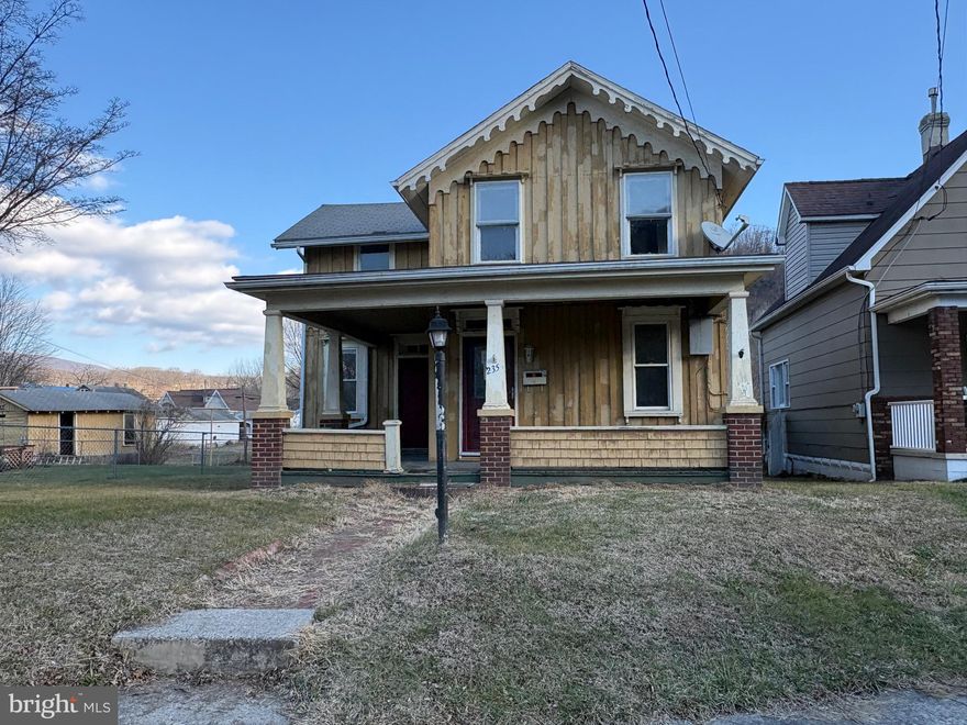 Older home with 3 bedrooms and 2 baths. Perfect project for investor or handyperson. Large level rear yard with 2 outbuildings.  This home has lots of potential .